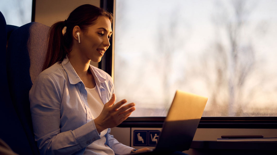 Woman on a video call while on a train